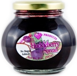 Jar of huckleberry spread with label.