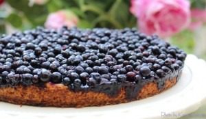 A delicious blueberry tart with a golden crust and fresh blueberries on top.