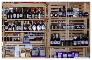 Shelves stocked with various bottles and jars in a store.