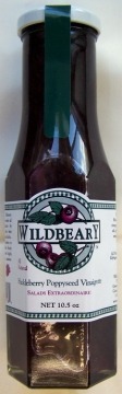 A bottle of Wildbear beverage with a berry-themed label.
