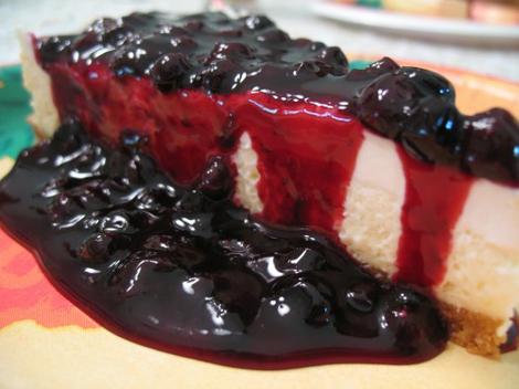 Rich cheesecake topped with a thick blueberry sauce.