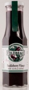 A bottle of Wild Bear cherry-flavored beverage with distinct label art.