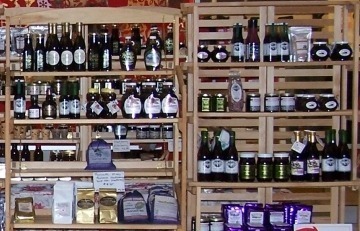 Shelves with assorted bottles and packaged goods.
