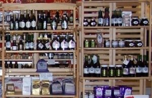 Shelves with various bottles and packaged goods.