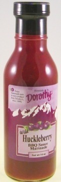 Bottle of Dorothy brand tomato ketchup with mountain design on the label.
