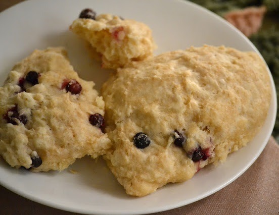 Berry scones on a white plate.