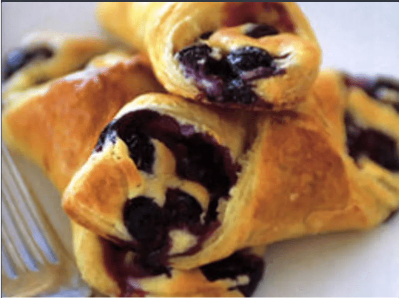 Delicious blueberry-filled crescent rolls with a golden crust.